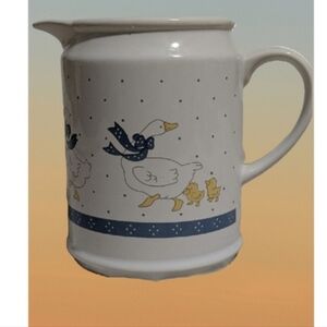 Vintage goose with blue ribbon ceramic pitcher